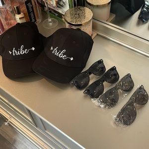 Two Tribe Hats. 4 โBride Tribeโ sunglasses.
